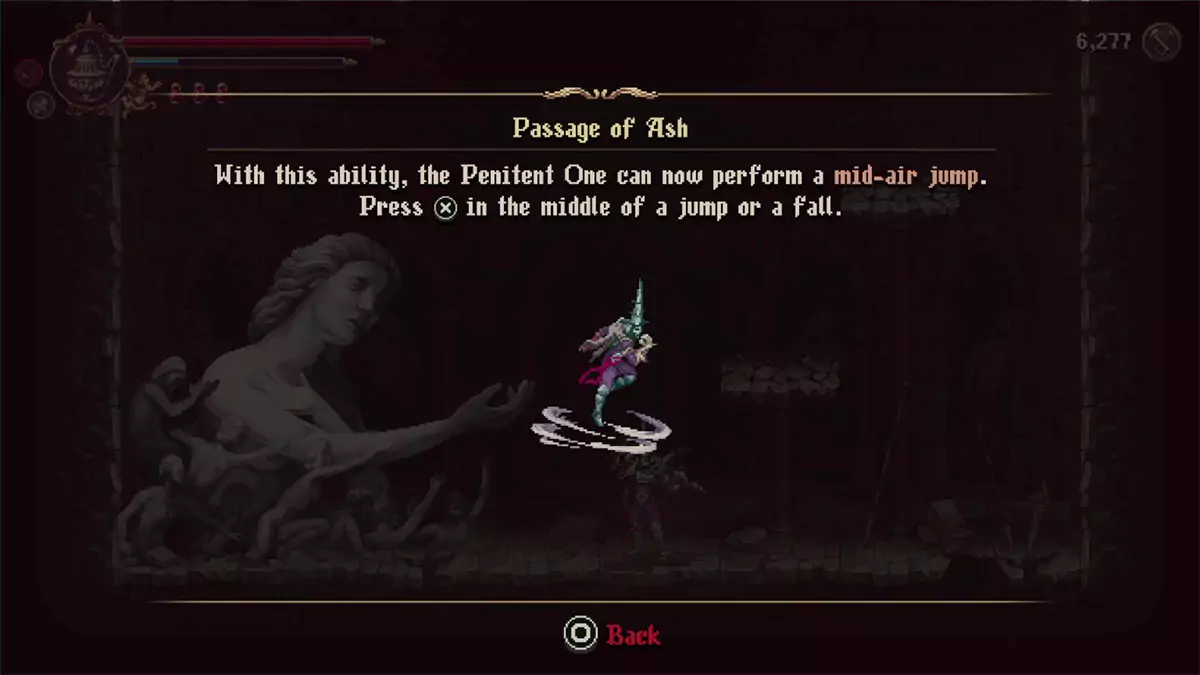 The game telling the player how to double jump with the Passage of Ash ability.