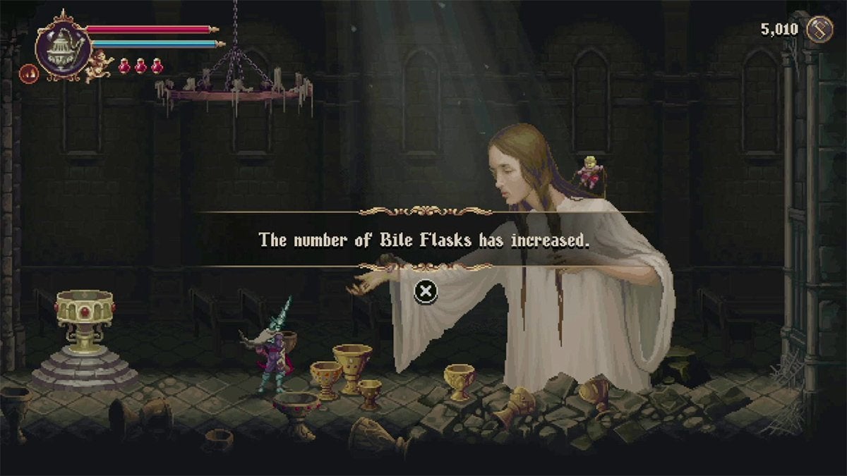The player getting more Bile Flasks in Blasphemous 2.