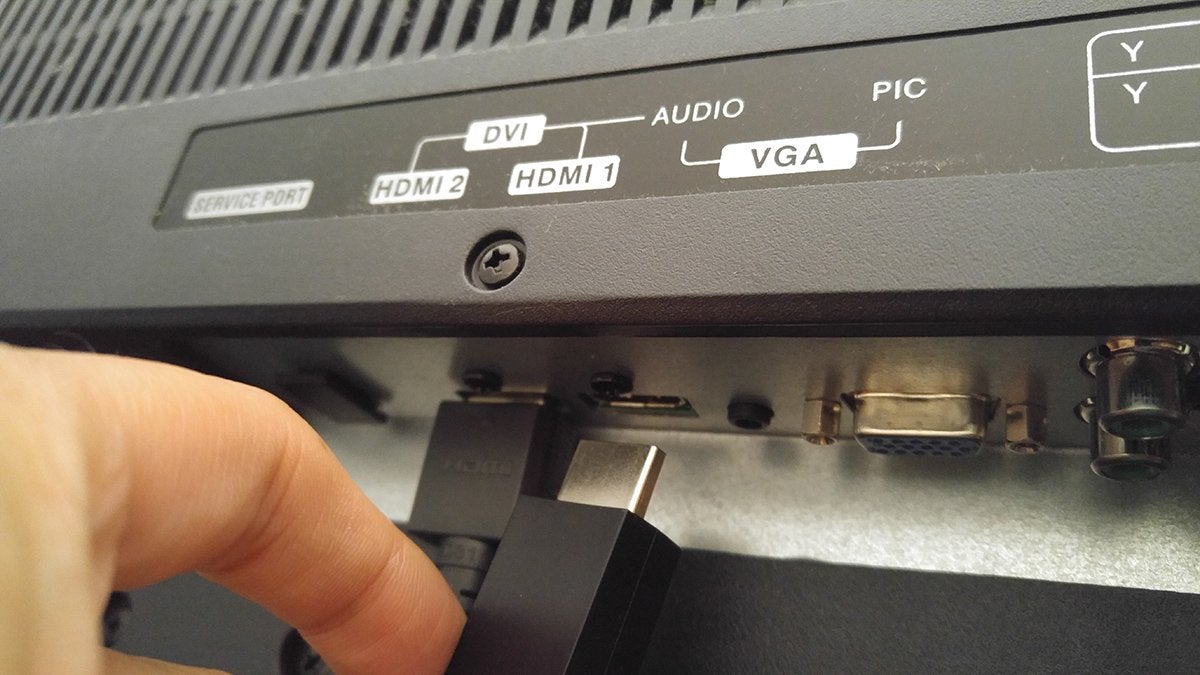 The HDMI in ports on the back of a monitor.