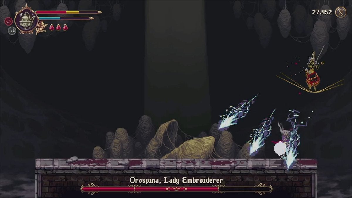 Orospina shooting three electric projectiles at the player.