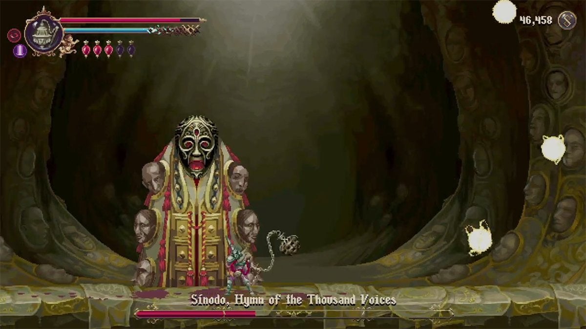 Sínodo's black mask face appearing in Phase 2 of the boss fight.