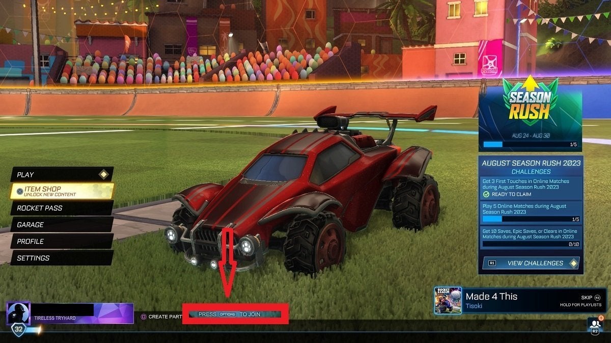 The main menu of Rocket League, highlighting the option button to split screen.