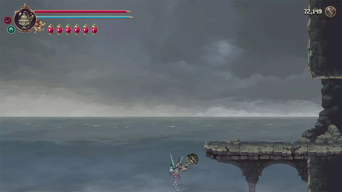 The player jumping off a ledge over the Sea of Ink.