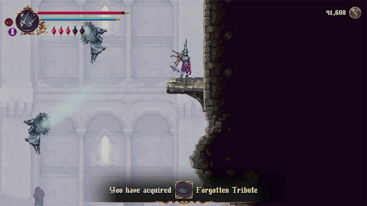The player picking up the Forgotten Tribute in the Sacred Entombments.