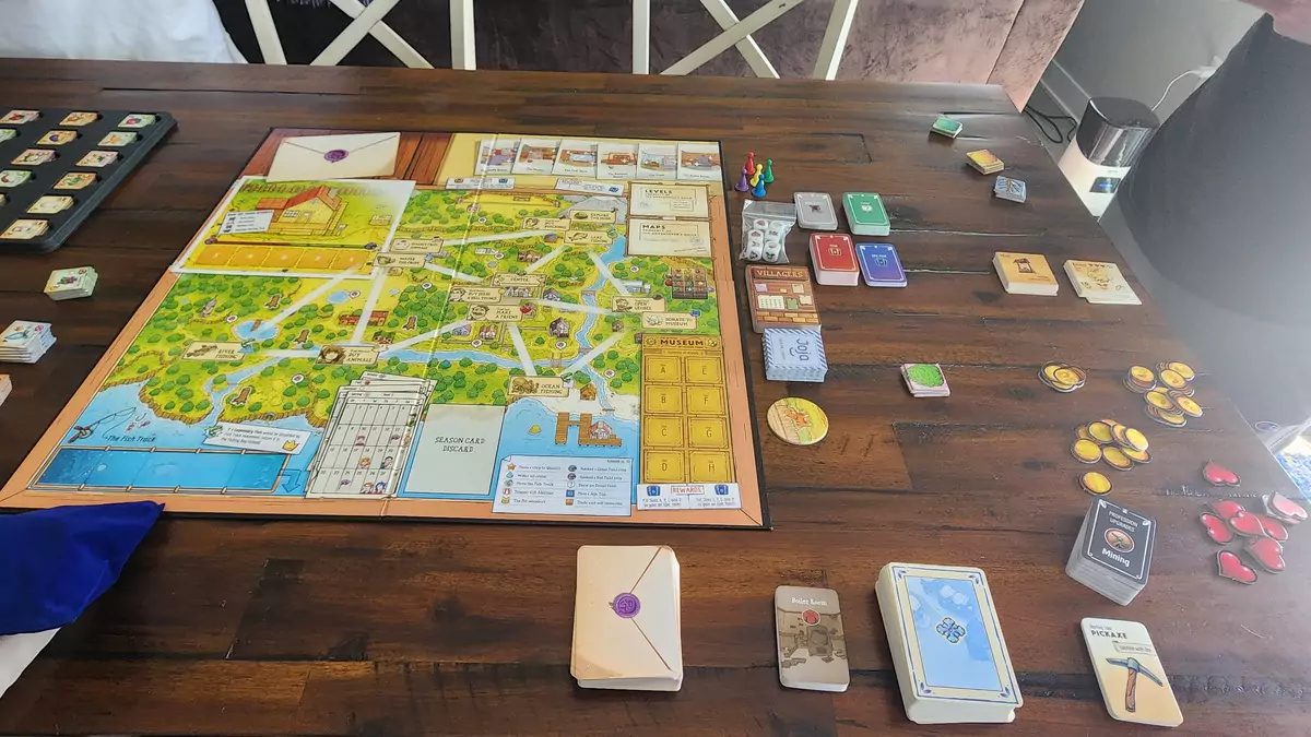 The board and components from the Stardew Valley board game.