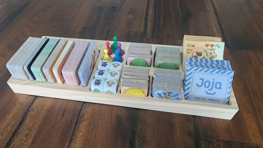A handmade component holder for the Stardew Valley board game by WalnutDesignCo on Etsy.