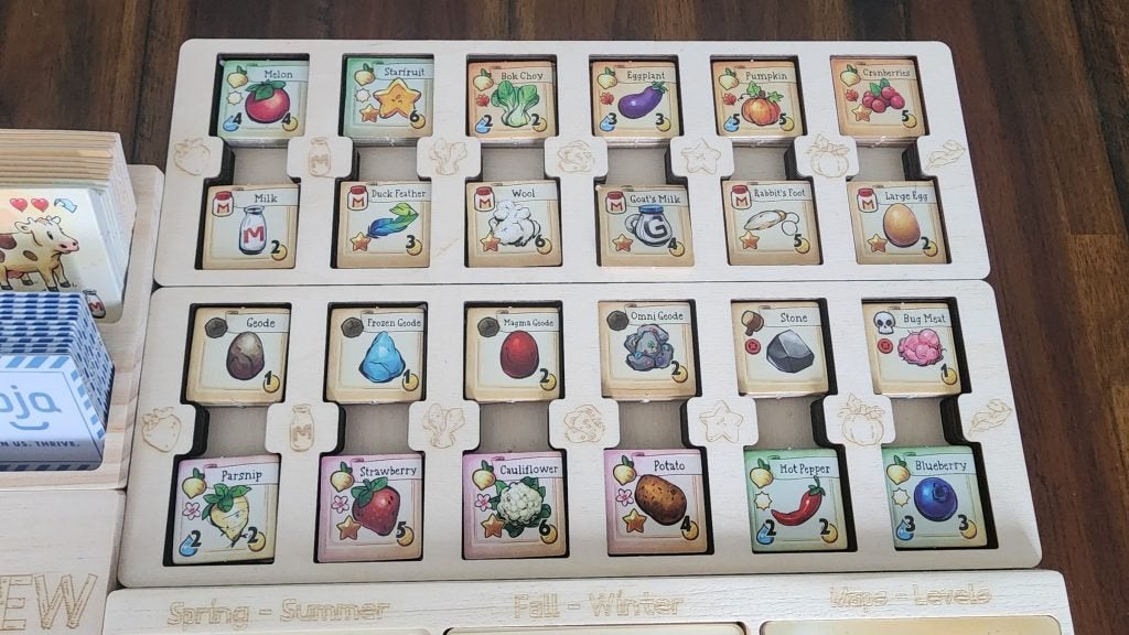 The many tiles found in the Stardew Valley board game.