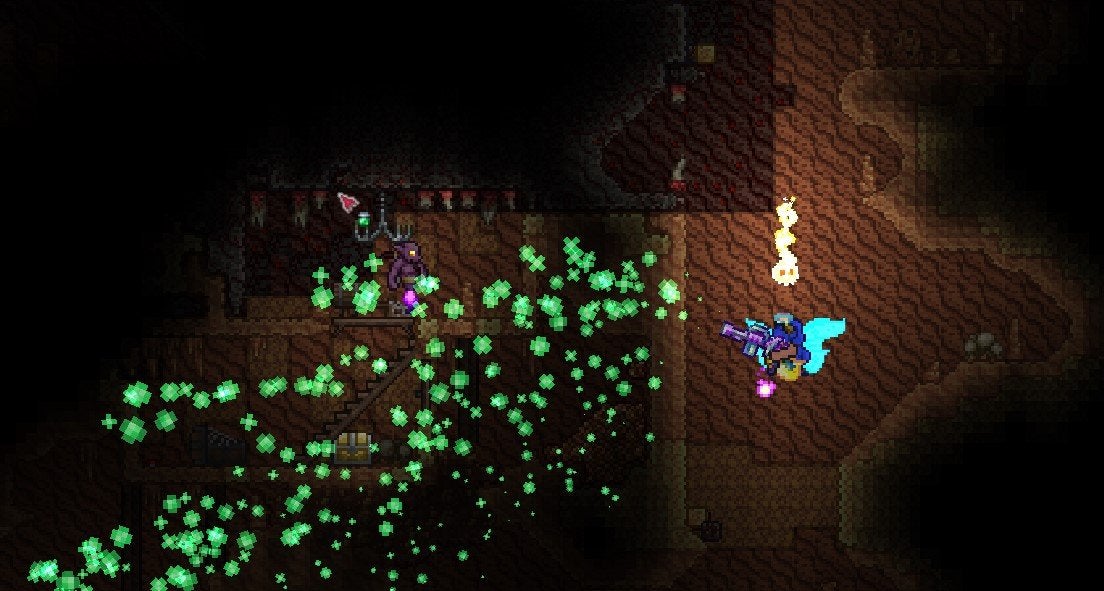 A Terraria player cleansing the Crimson-corrupted Desert biome using a Terraformer with Green Solution. 