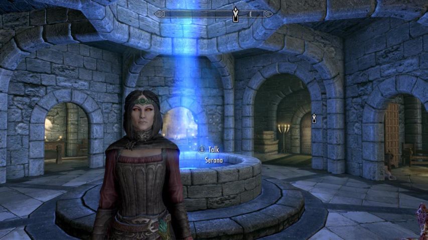 Serana from Skyrim standing inside the College of Winterhold