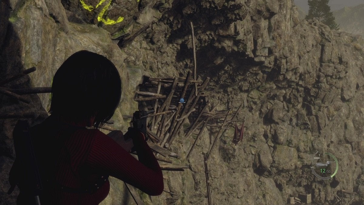 Ada aiming at a Blue Medallion in the Cliffside area.