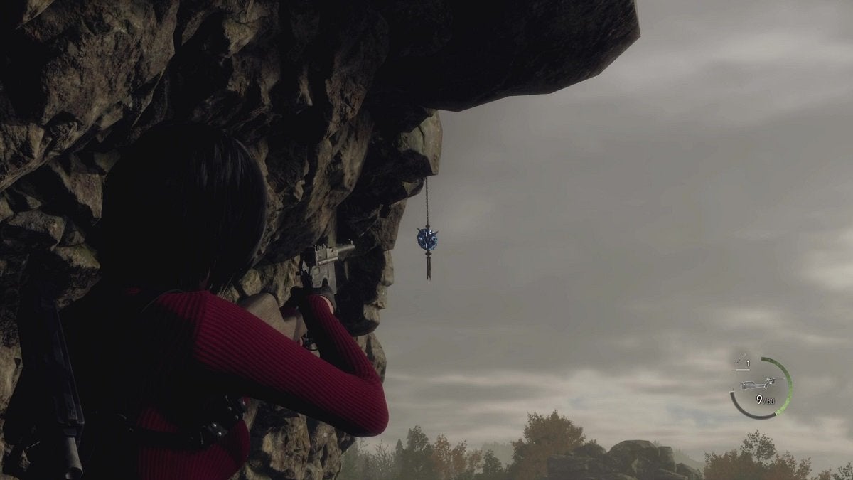 Ada aiming at a Blue Medallion in the Cliffside.