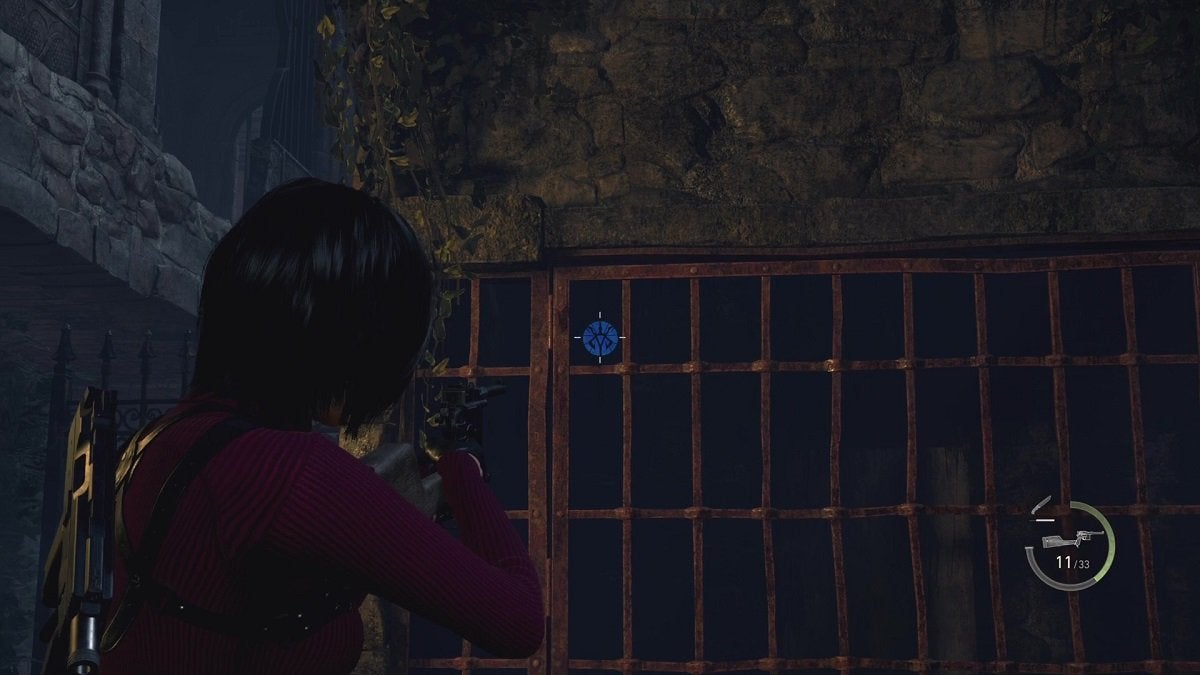 Ada aiming at a Blue Medallion located inside a cage.
