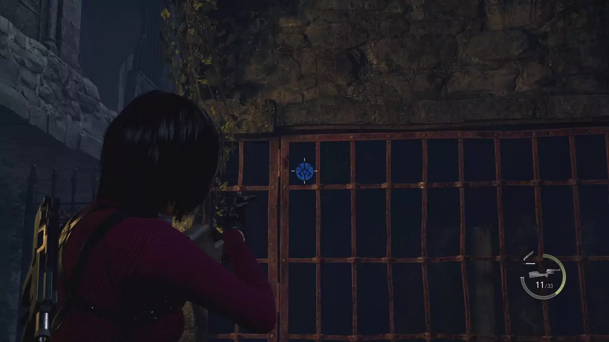 Ada aiming at a Blue Medallion located inside a cage.
