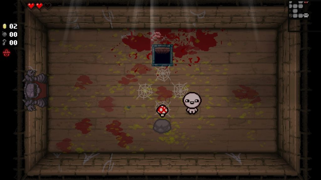 A player standing to the right of a Magic Mushroom powerup in Binding of Isaac: Rebirth. 