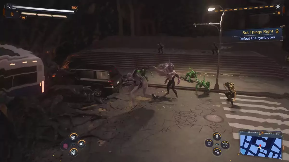 Peter throwing an Anti-Venom bomb at enemies in Spider-Man 2. The fight is happening on a partially-destroyed street at night.