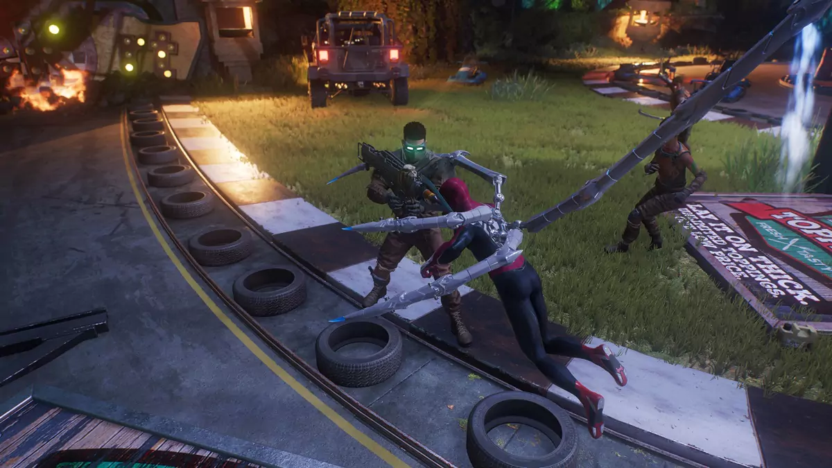 Peter attacking enemies in Spider-Man 2 with robotic spider limbs coming out of his back. He and the enemies are near a grassy area.