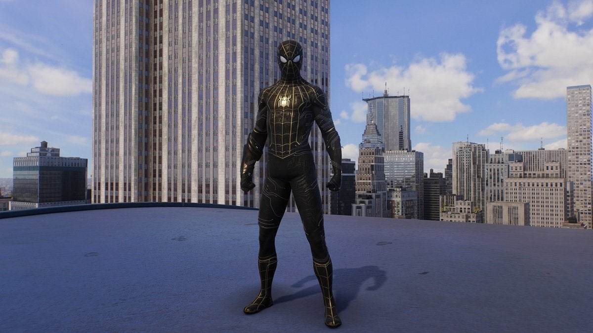 Peter Parker wearing the Black and Gold Suit, which is black and gold with golden web designs and a small golden spider on the chest.