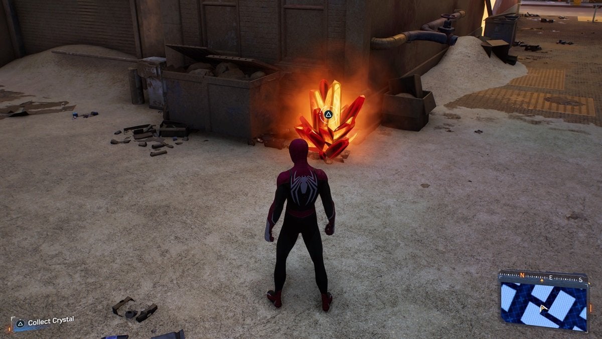 Peter Parker standing across one of Marko's Memories in Spider-Man 2. Marko's Memories look like large orange crystals.
