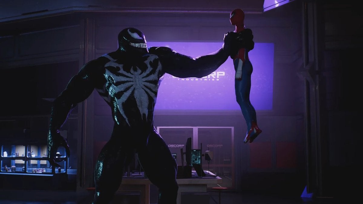 Venom holding Spider-Man up with one arm.