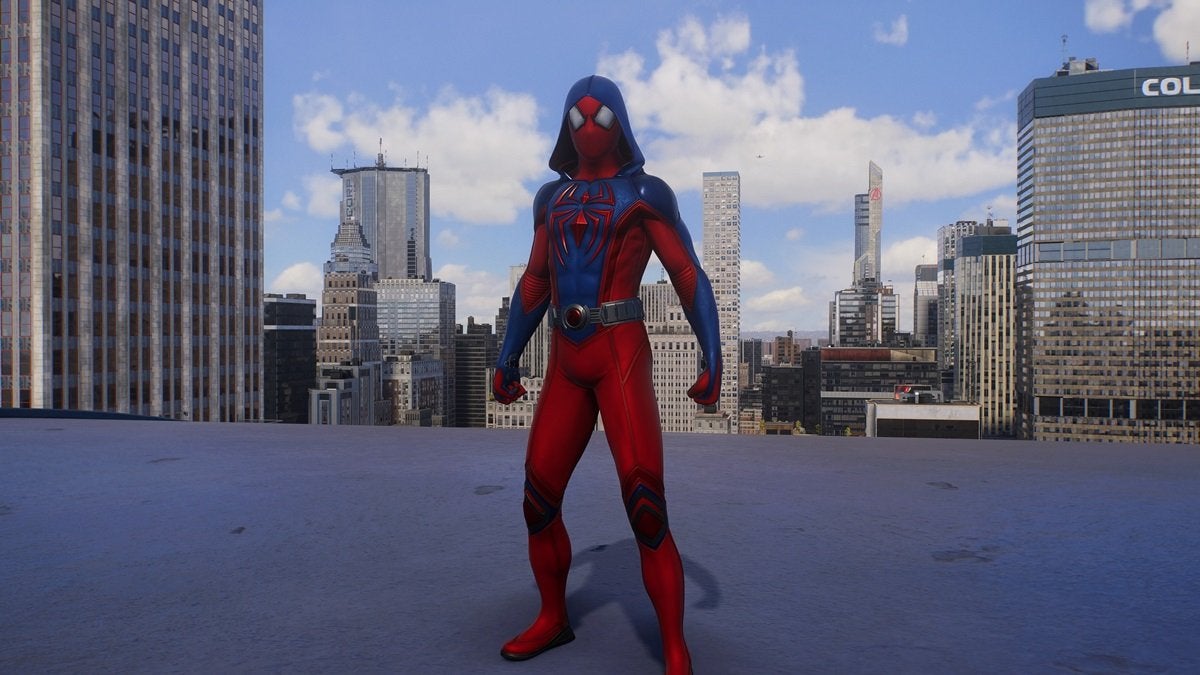 Peter Parker wearing the Scarlet III Suit, which is red and blue with a red spider on the chest. This suit also comes with a blue hood.