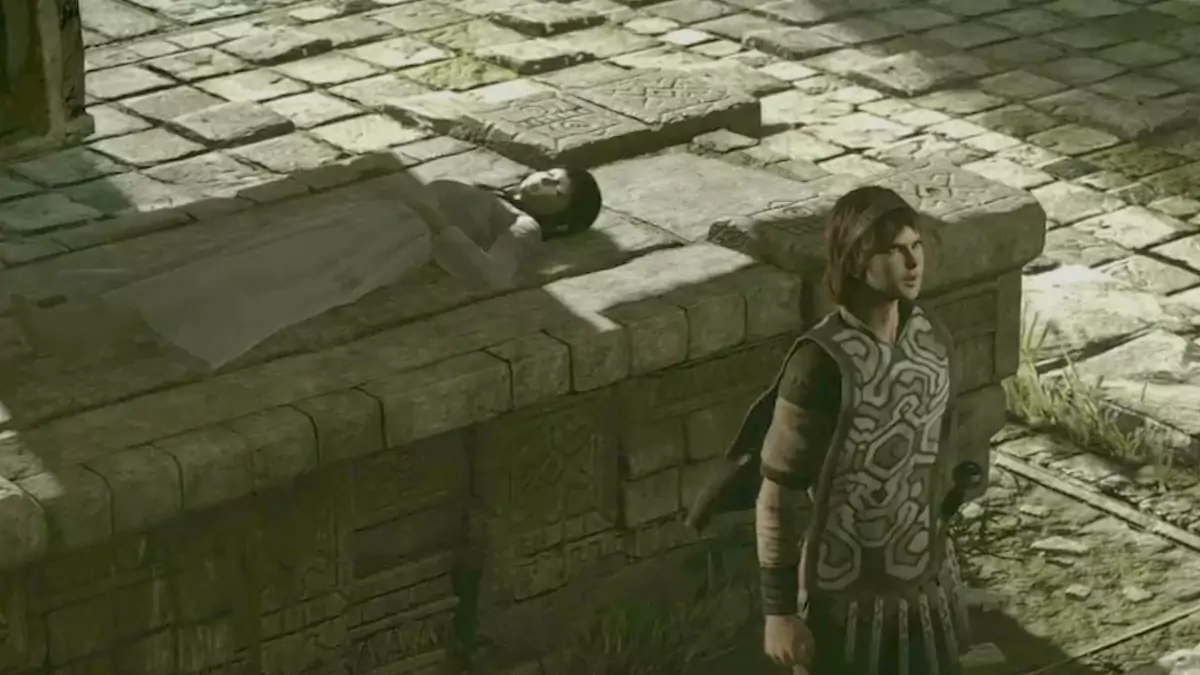 Wander standing next to the dead body of Mono in Shadow of the Colossus.
