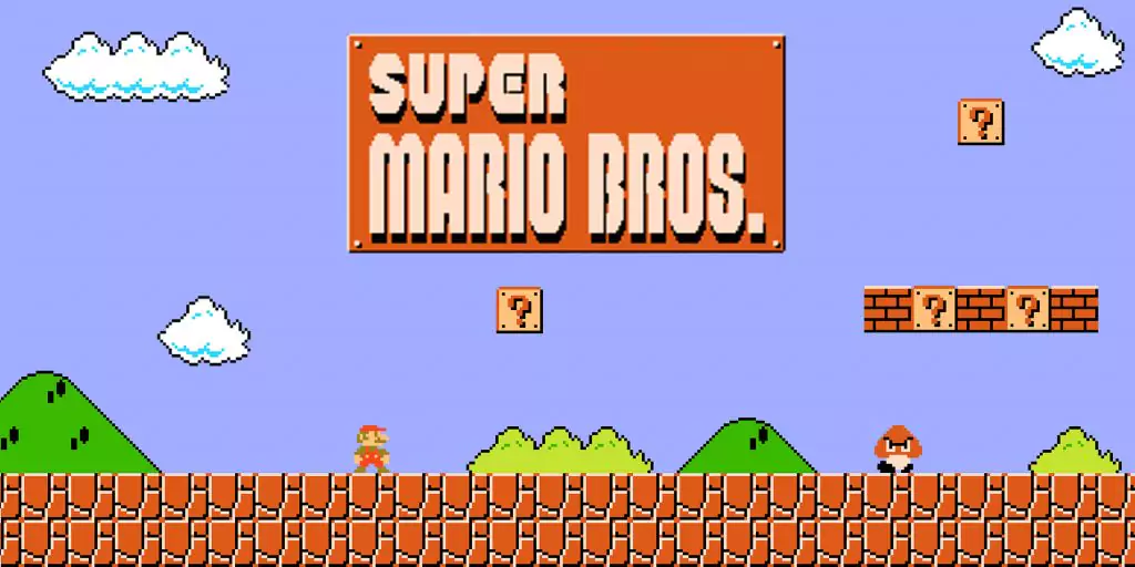 The title screen of the Platformer game Super Mario Bros. depicting the eponymous Mario under the game's title text and standing near a hovering block that has a question mark on it.