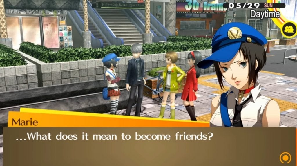 Marie is standing next to the protagonist of Persona 4 Golden as well as Chie and Yukiko in front of Okina Station. 