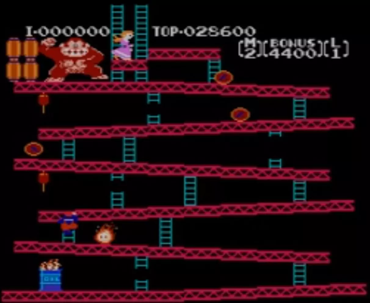 Jumpman (Mario) climbing a ladder to get closer to Donkey Kong and Princess Pauline in the Platformer game Donkey Kong.
