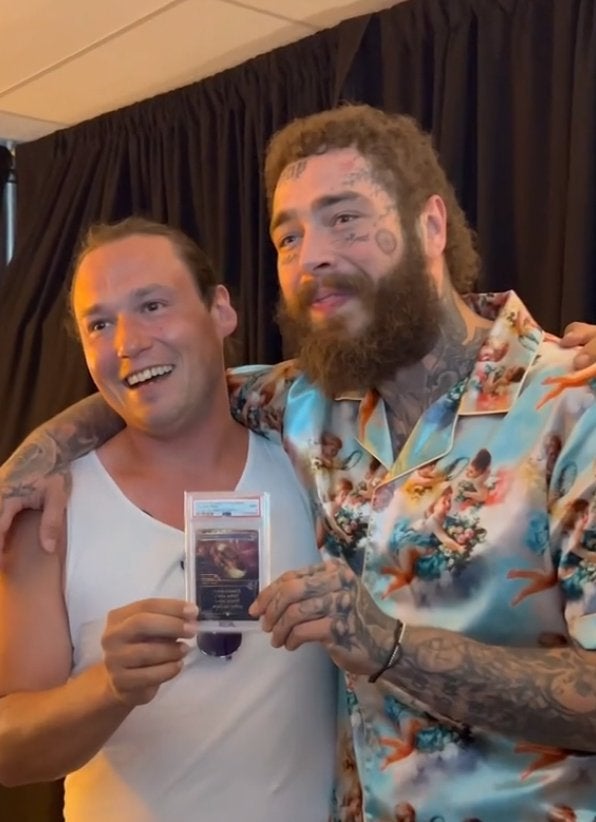 Brook Trafton and Post Malone hugging and holding the 1:1 The One Ring MTG card.