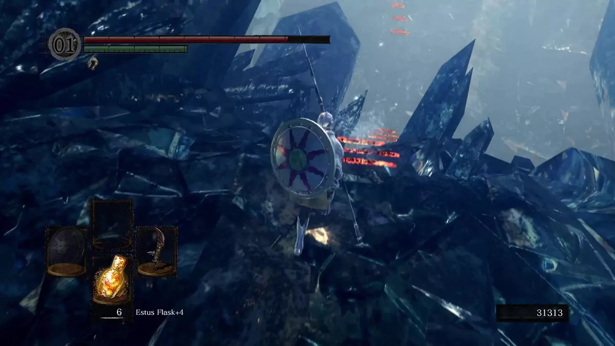 The Chosen Undead walking towards falling snow in the Crystal Cave.