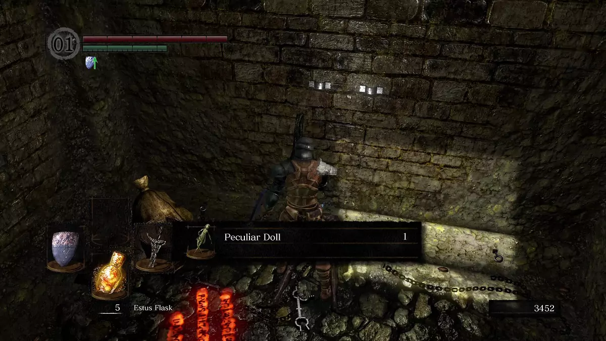 The Chosen Undead picking up the Peculiar Doll.