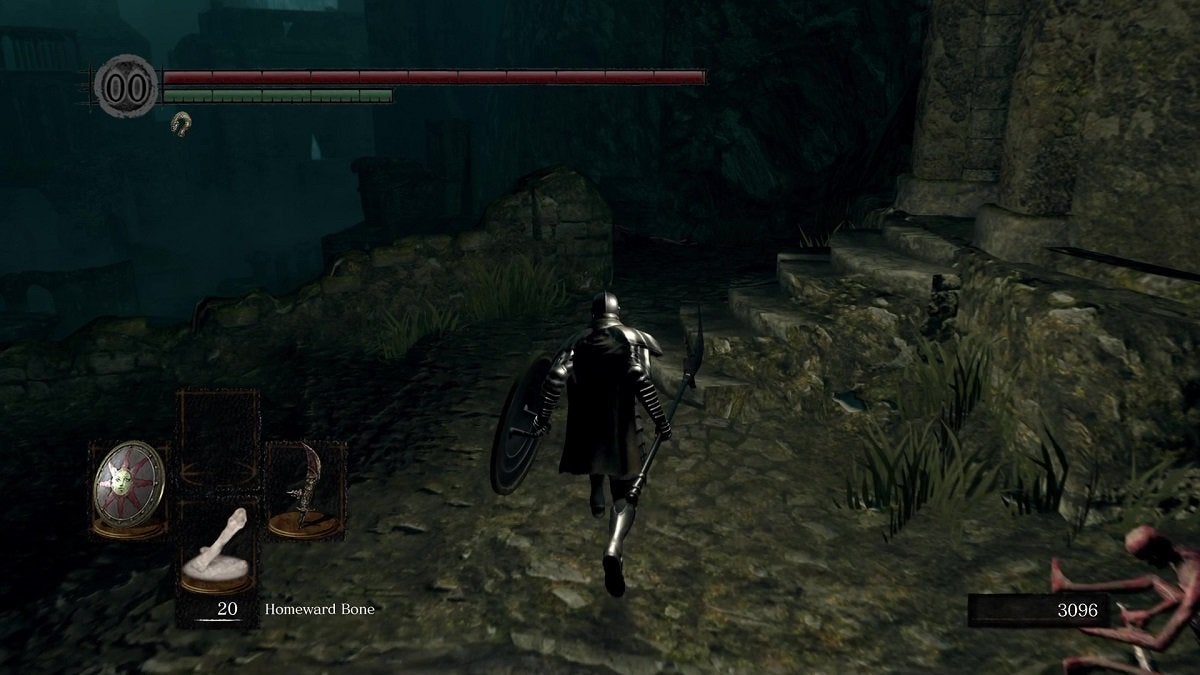 The Chosen Undead running towards a staircase in New Londo Ruins.