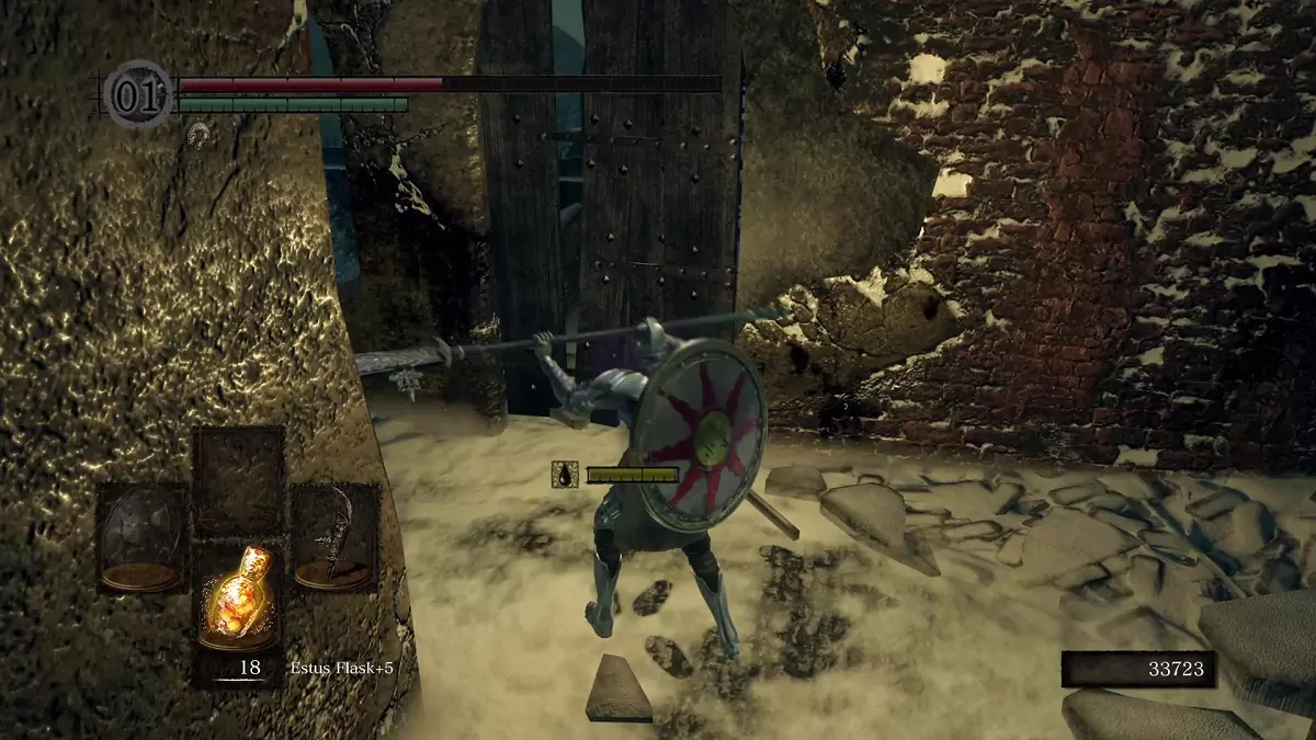 The Chosen Undead attacking a breakable door.