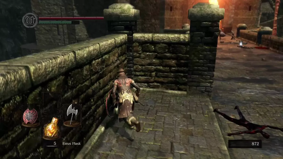 The Chosen Undead standing on the bridge guarded by the Hellkite Wyvern in Undead Burg.