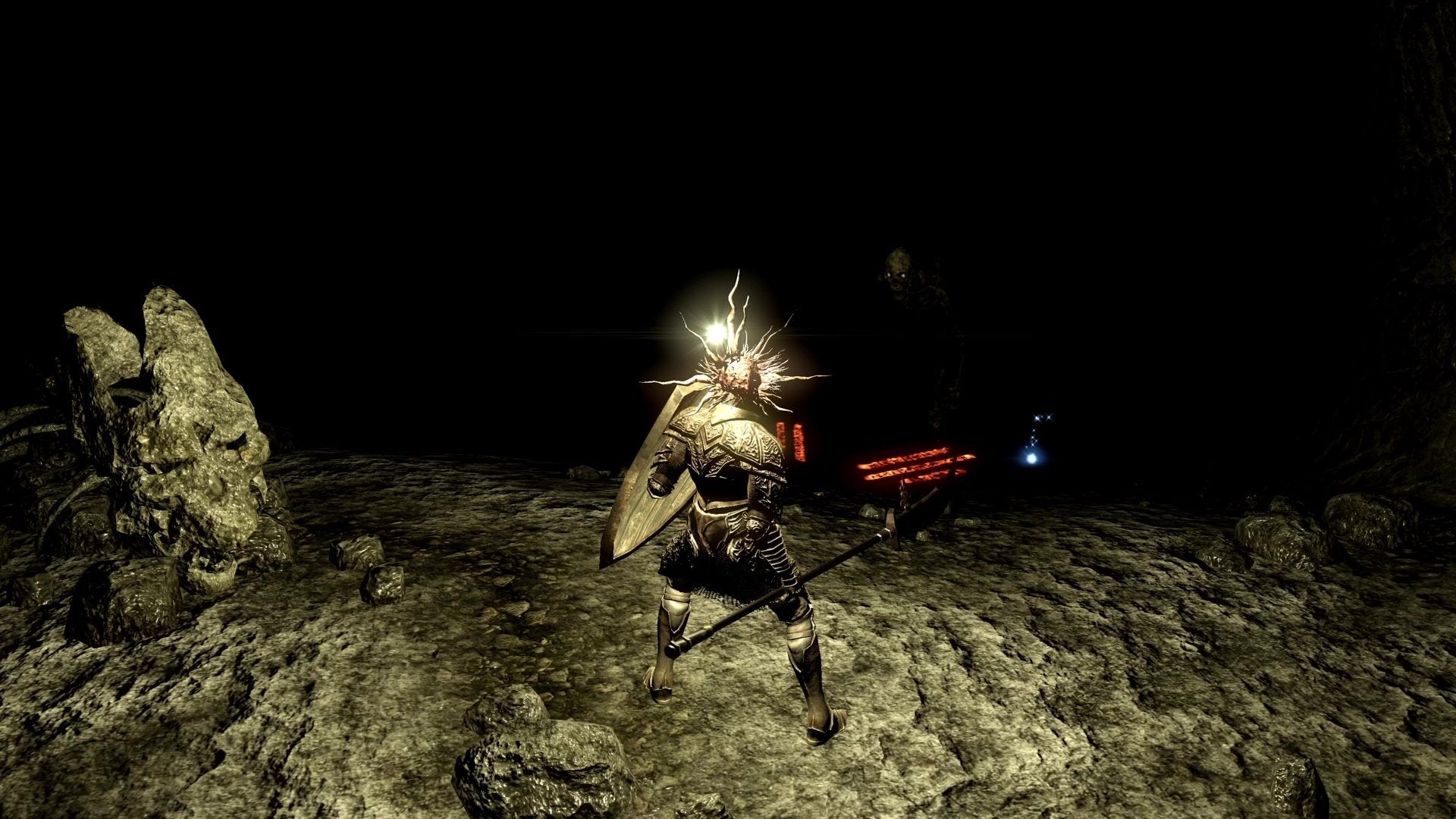 The Chosen Undead in the Tomb of the Giants in Dark Souls.