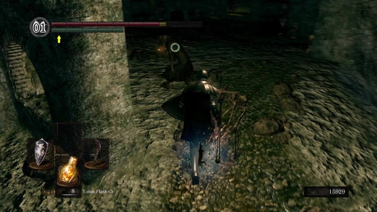The Chosen Undead chasing an Undead Mage in The Catacombs of Dark Souls.