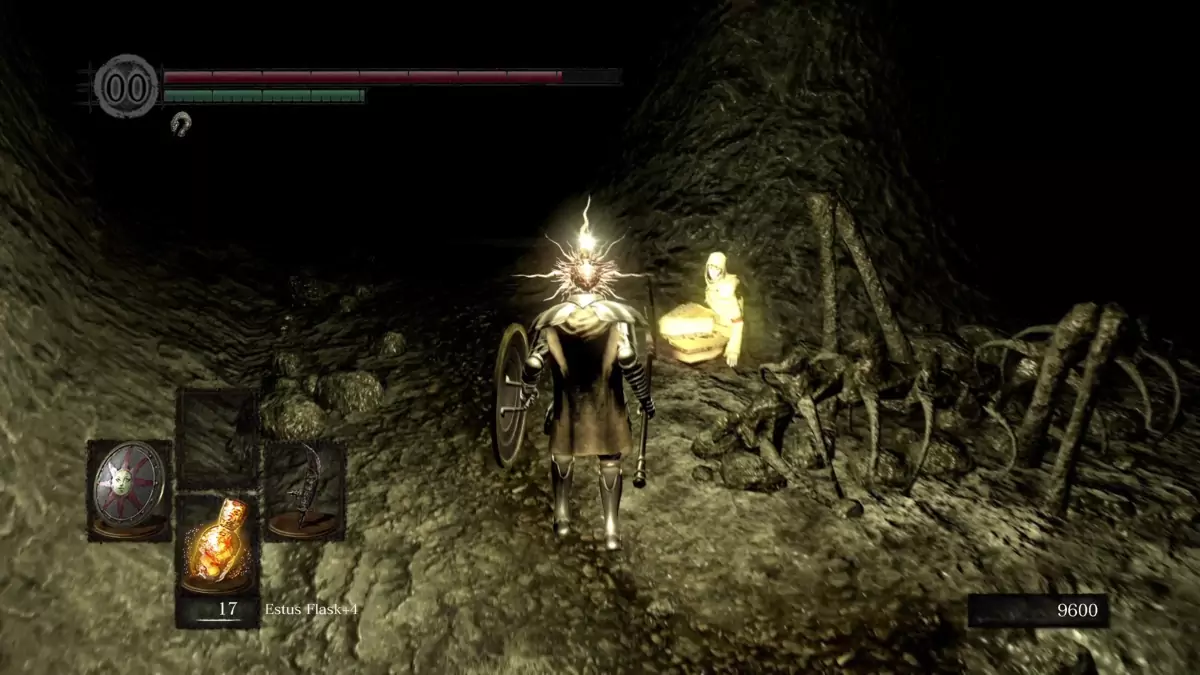 The Chosen Undead standing before Reah in the Tomb of Giants.