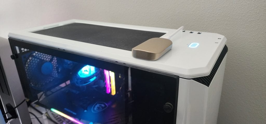 The Beetle X31 Portable SSD sitting on top of a PC tower.