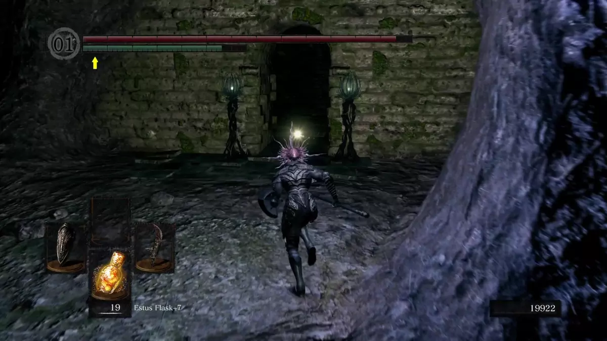 The Chosen Undead running towards a lift room in the Chasm of the Abyss.