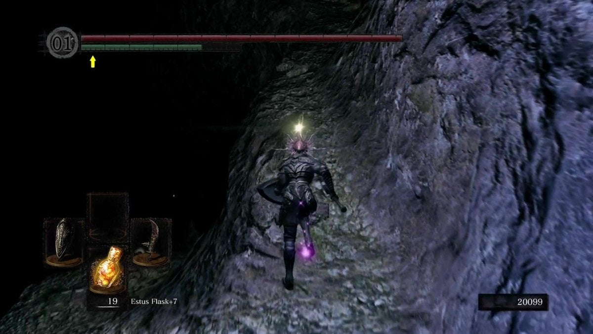 The Chosen Undead running on a slope in the Chasm of the Abyss.
