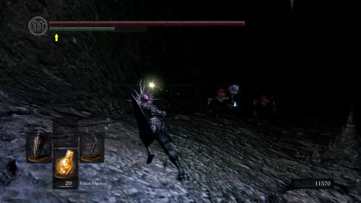 The Chosen Undead running to a dark cavern in the Chasm of the Abyss.