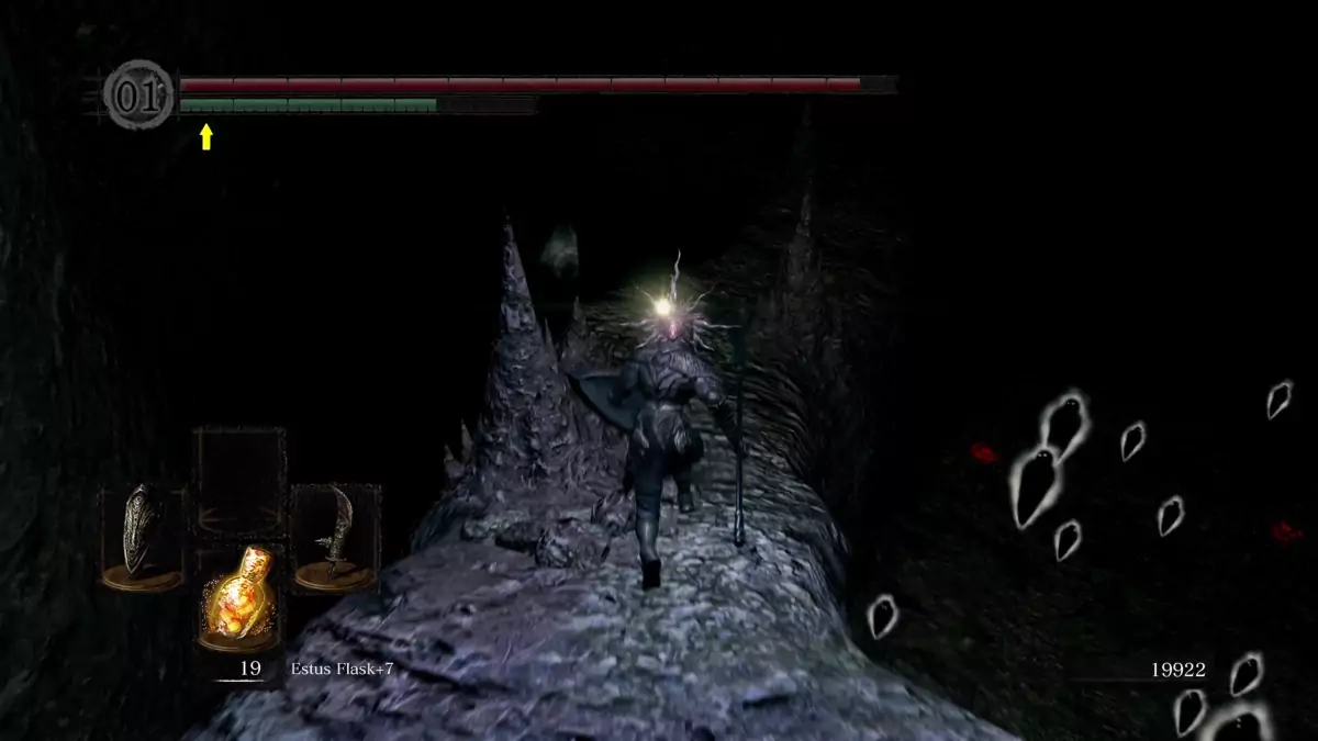 The Chosen Undead running on a stone bridge in the Chasm of the Abyss.