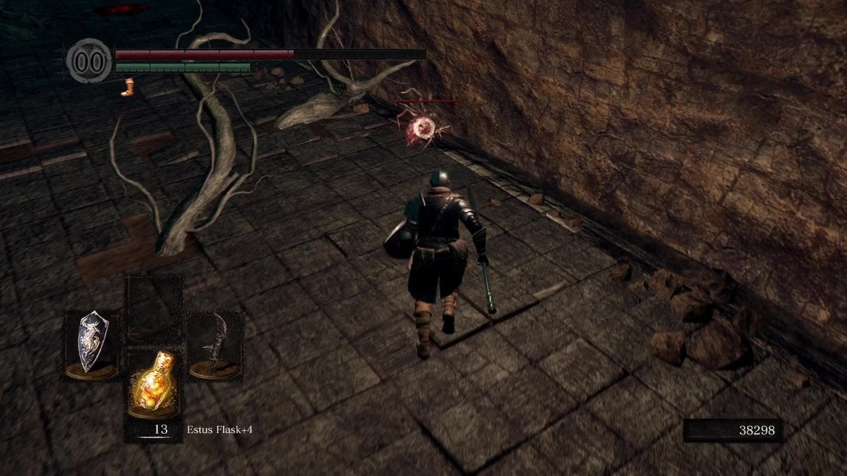 The Chosen Undead trying to get a Sunlight Medal by killing a Chaos Bug in Dark Souls.