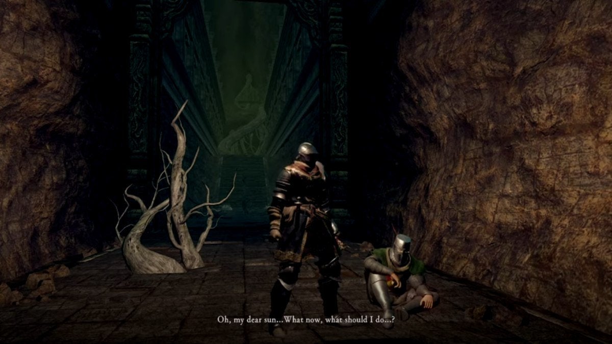 The Chosen Undead speaking to a sitting Solaire in the Demon Ruins of Dark Souls.