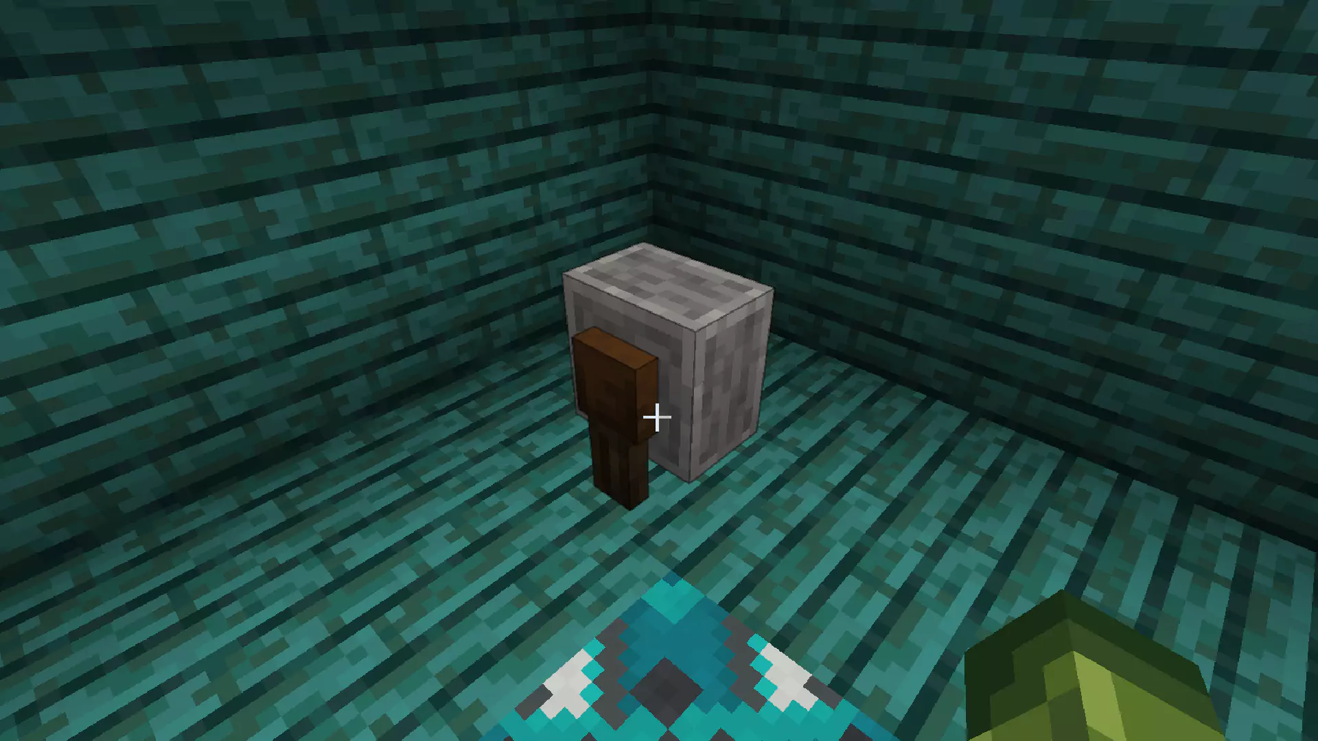 A Grindstone in a green wooden house in Minecraft.