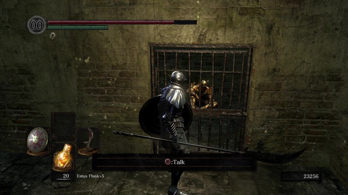 The Chosen Undead about to free Knight Lautrec from his prison cell to get a Sunlight Medal in Dark Souls.