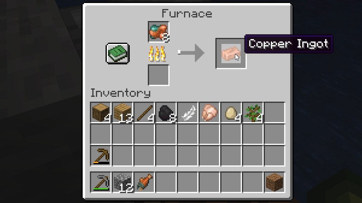 A player smelting Raw Copper into Copper Ingots in a Furnace.