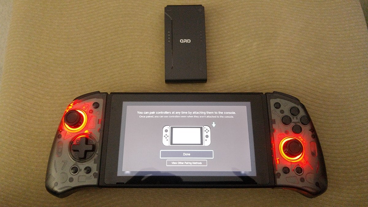 A Stellar T5 Joy-Cons slotted into a Nintendo Switch.