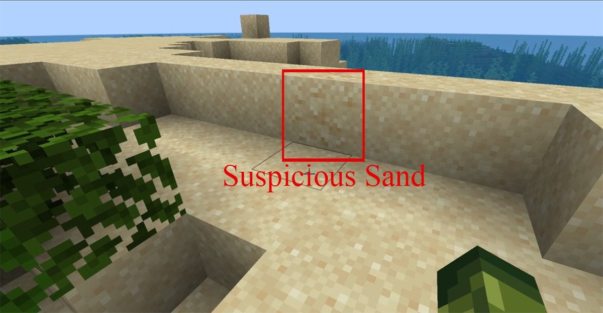 Suspicious Sand next to regular Sand in Minecraft.