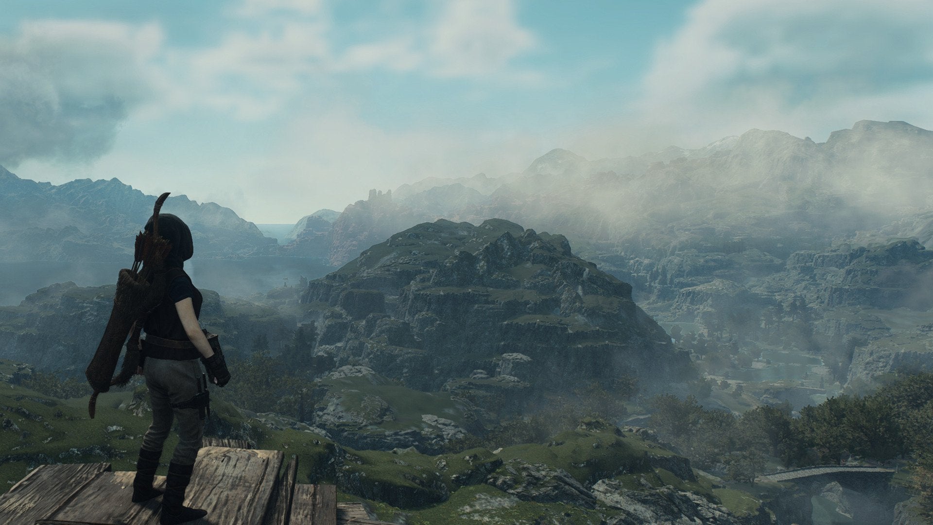 The Arisen looking over the vast landscape in Dragon's Dogma 2.